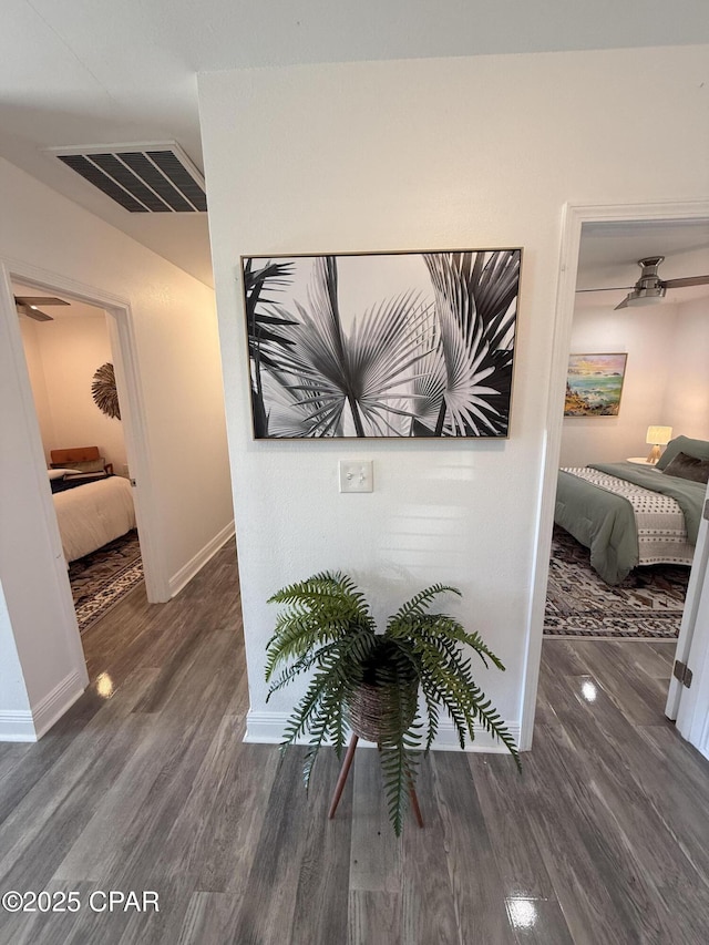 410 W 4th St, Lynn Haven, FL 32444 - hall featuring wood finished floors and baseboards