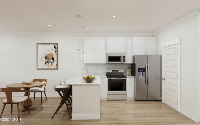 kitchen featuring stainless steel appliances, backsplash, white cabinetry, and pendant lighting