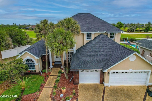 view of front of property with a garage