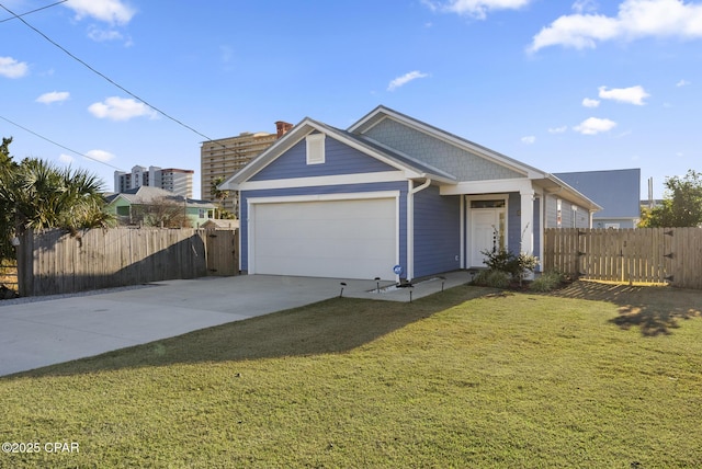 view of front facade with a front lawn and a garage