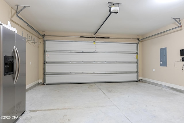 garage with electric panel, stainless steel fridge with ice dispenser, and a garage door opener