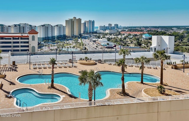 view of swimming pool with a patio area