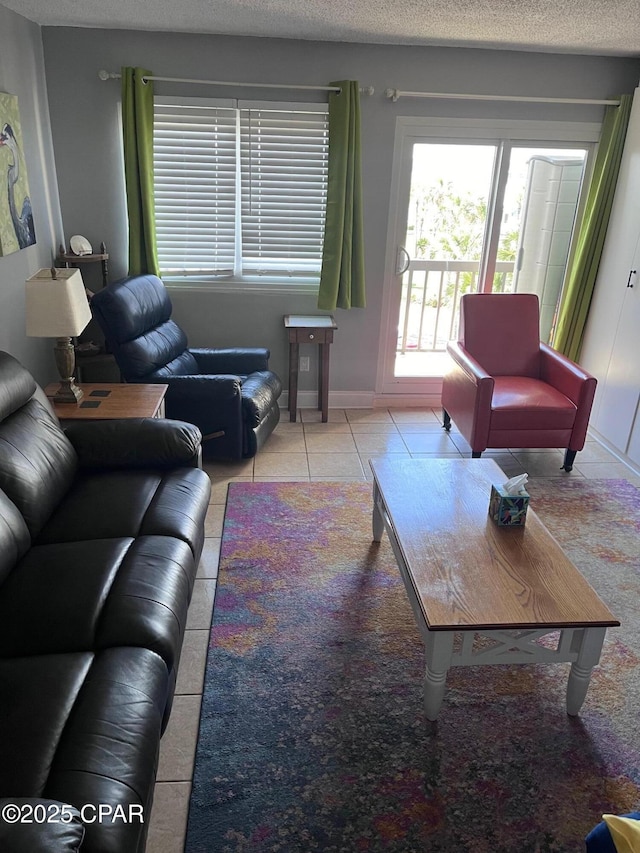 tiled living room with a textured ceiling