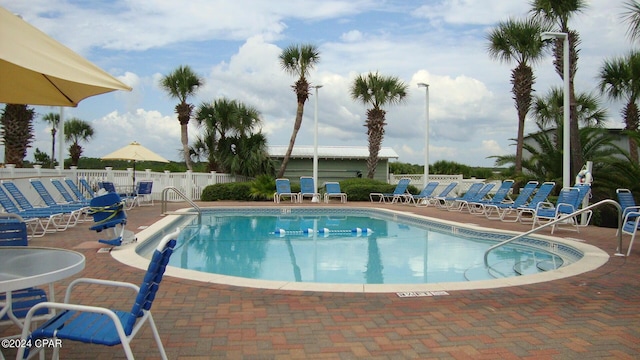 view of swimming pool featuring a patio