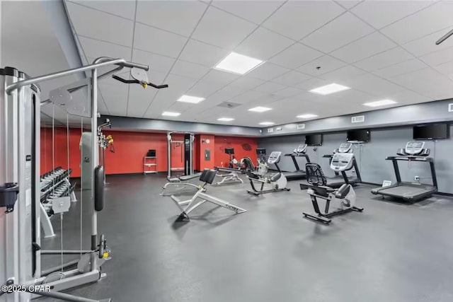 workout area with a drop ceiling