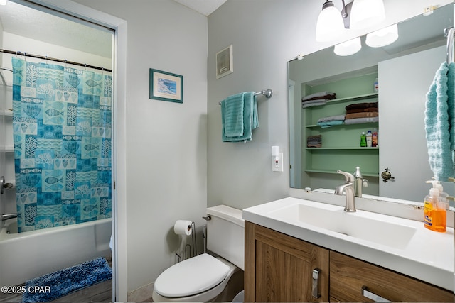 full bathroom featuring vanity, toilet, and shower / tub combo with curtain