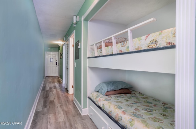 bedroom with light wood-type flooring