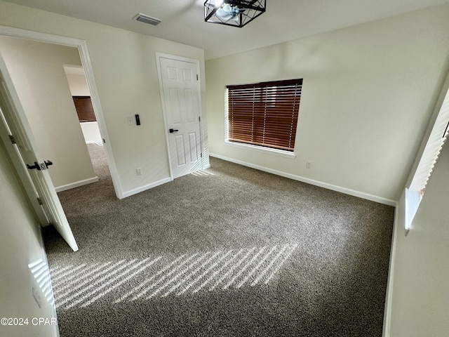 interior space featuring carpet