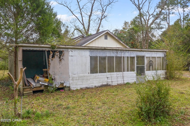 exterior space with a lawn