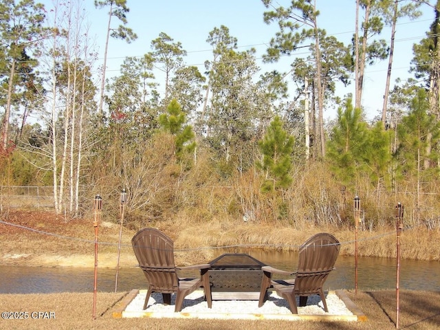 view of patio / terrace with a fire pit