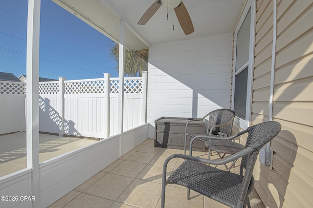 exterior space featuring ceiling fan