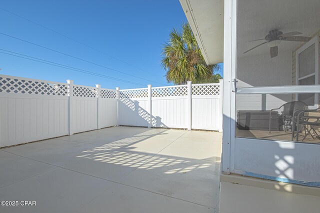 view of patio with ceiling fan