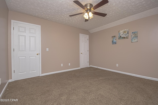 unfurnished bedroom with baseboards, carpet floors, a textured ceiling, and a ceiling fan