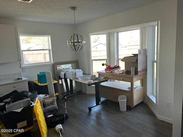 office featuring a chandelier and dark hardwood / wood-style flooring