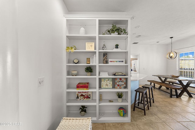 interior space featuring light tile patterned floors