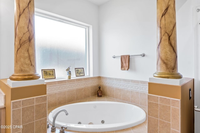 bathroom featuring tiled bath