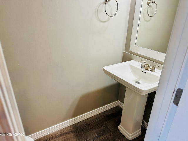 bathroom featuring wood-type flooring