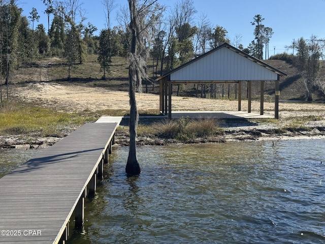 dock area featuring a gazebo and a water view