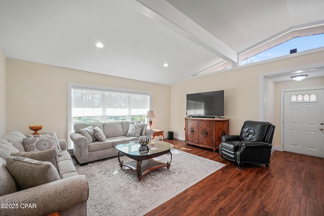 living room featuring dark wood-type flooring and vaulted ceiling with beams