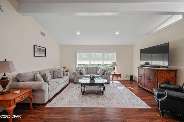 living room with dark hardwood / wood-style flooring and lofted ceiling with beams