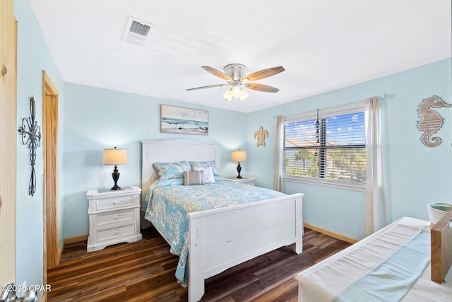 bedroom featuring dark wood-type flooring and ceiling fan