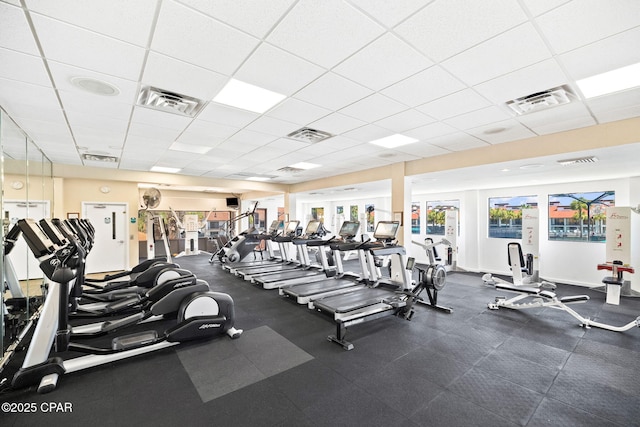 workout area featuring a paneled ceiling