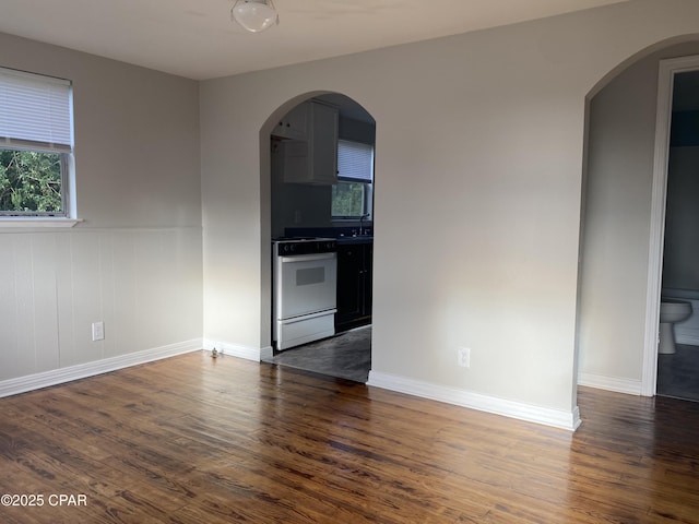 interior space with dark hardwood / wood-style floors and sink