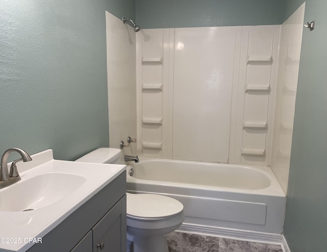 full bathroom featuring shower / washtub combination, vanity, and toilet