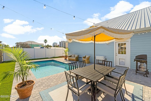 view of swimming pool featuring a patio area