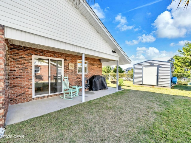 back of property with a storage unit, a patio area, and a lawn