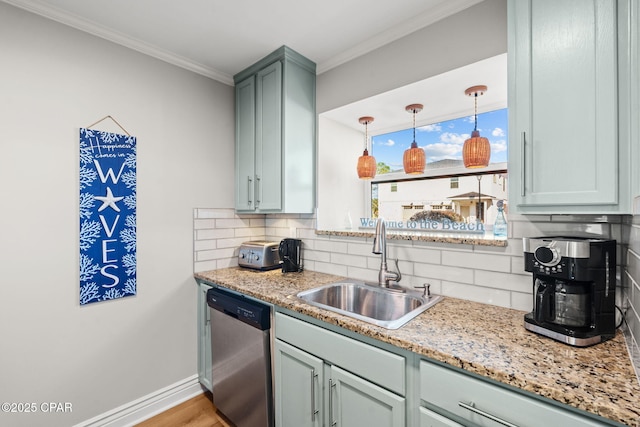 kitchen featuring light stone countertops, dishwasher, sink, backsplash, and crown molding