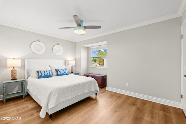 bedroom with ceiling fan, wood-type flooring, and ornamental molding