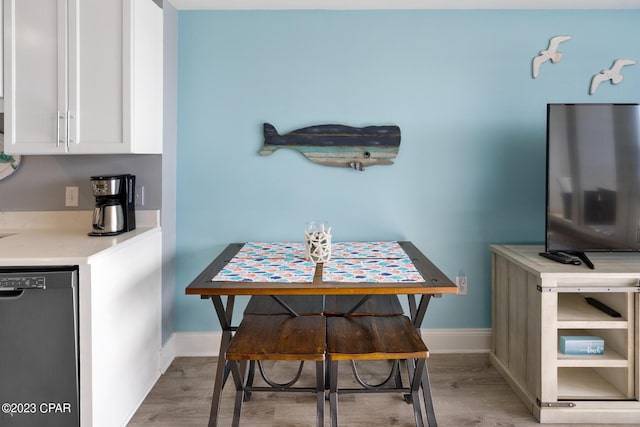 dining space featuring light hardwood / wood-style flooring