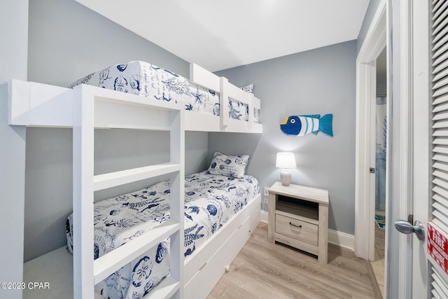 bedroom featuring light wood-type flooring