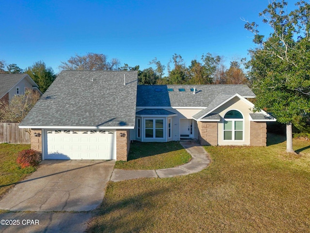 view of front facade featuring a front lawn and a garage