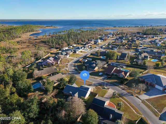 bird's eye view with a water view