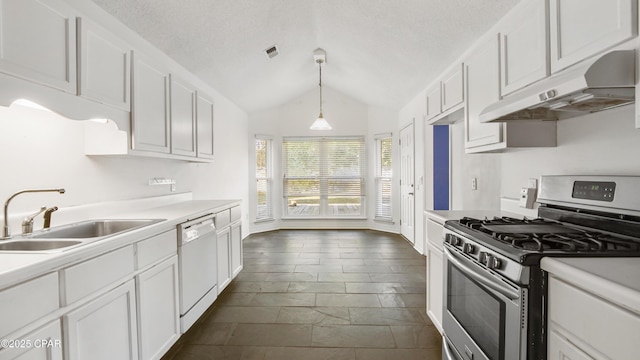 kitchen featuring gas range, white dishwasher, white cabinetry, and sink