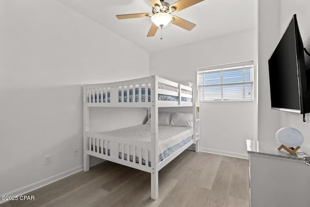 unfurnished bedroom featuring ceiling fan and light wood-type flooring