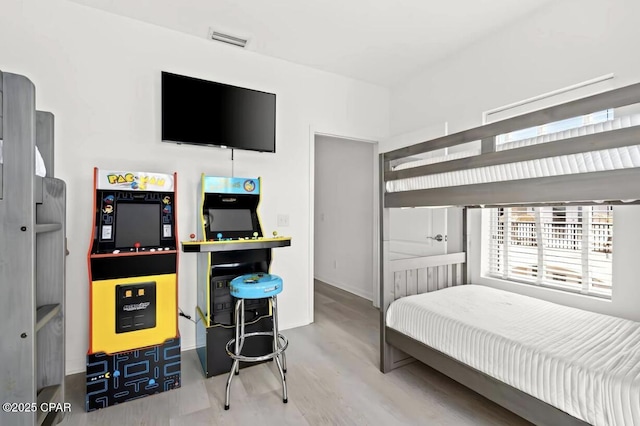 bedroom with wood-type flooring