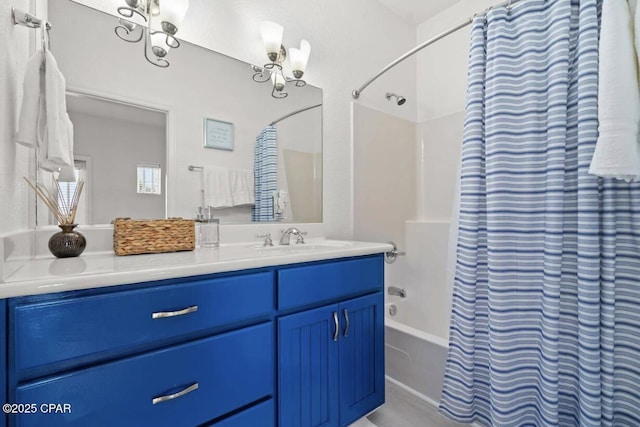 bathroom featuring vanity and shower / bath combo