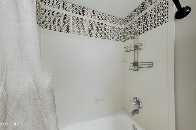 room details with shower / bath combination with curtain