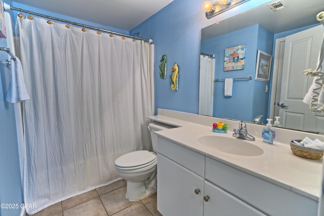 full bathroom featuring visible vents, curtained shower, toilet, vanity, and tile patterned flooring