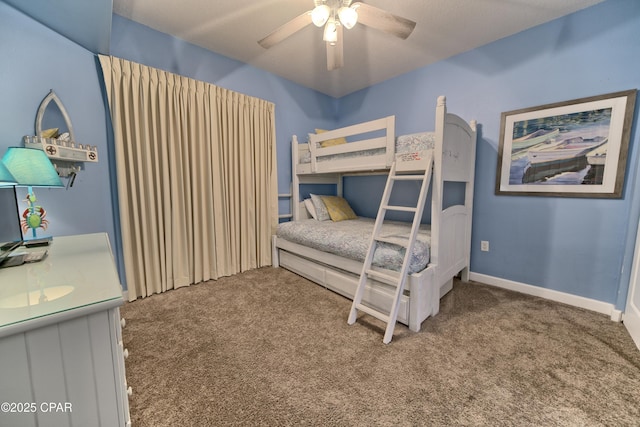 bedroom with a textured ceiling, carpet floors, and ceiling fan