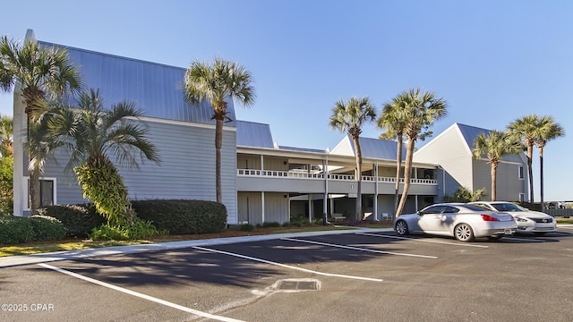 4271 Kingfish Ln Unit 271, Panama City Beach, FL 32408 - view of building exterior with uncovered parking