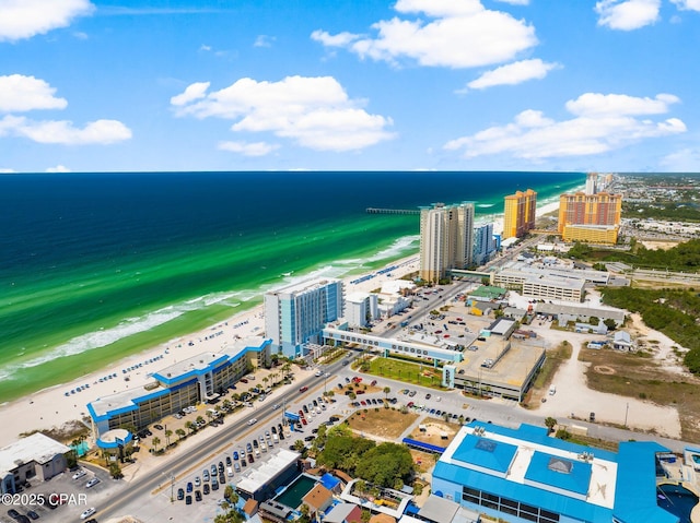 bird's eye view featuring a beach view and a water view