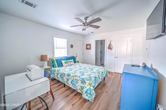 bedroom featuring ceiling fan and light wood-type flooring