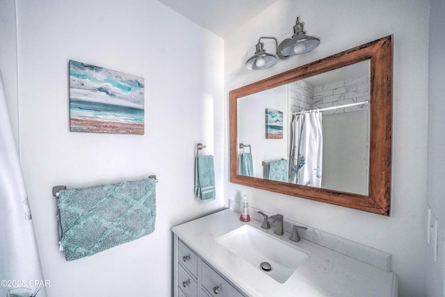 bathroom with vanity and walk in shower