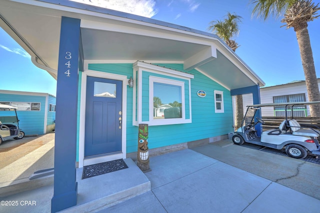 entrance to property with covered porch