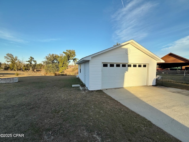 garage with a lawn