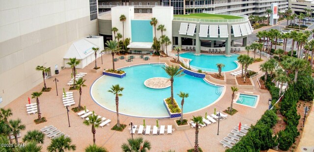 view of swimming pool featuring a patio